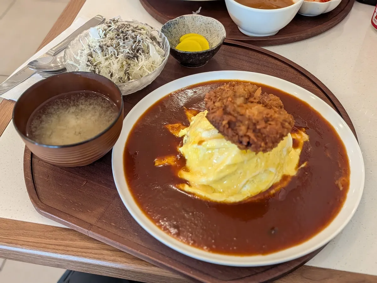 Omelette rice with katsu, miso soup, and salad